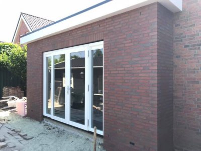 Foto Aanbouw aan woning